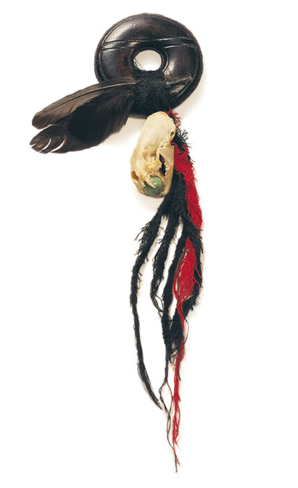 Cultic proto-money, 1997., ceramics, feather, ferret skull &c., mixed media, 330 x 125 mm
