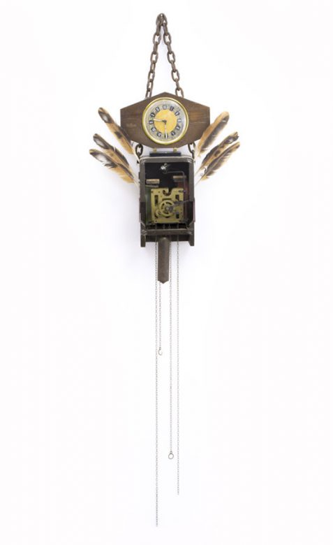 Cuckoo breast decoration, 2018, wood, iron, clockwork, feathers &c., mixed media, 67 x 38 cm