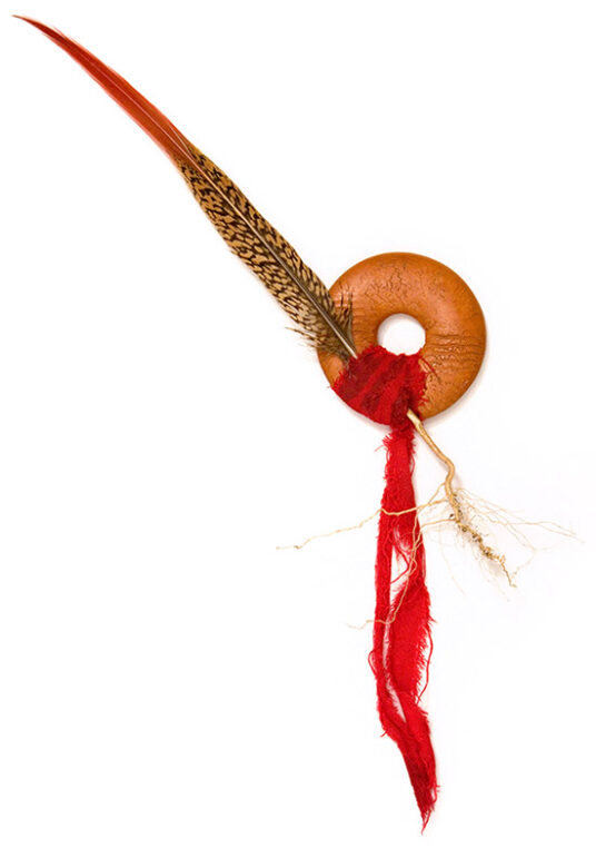Cultic proto-money, 1997., ceramics, feather, textile &c., mixed media, 350 x 250 mm